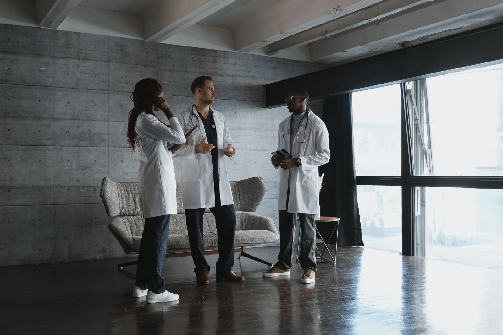 Medical professionals discussing healthcare matters in a modern environment